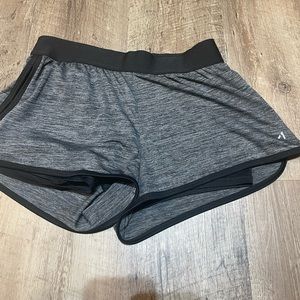 gray and black running shorts